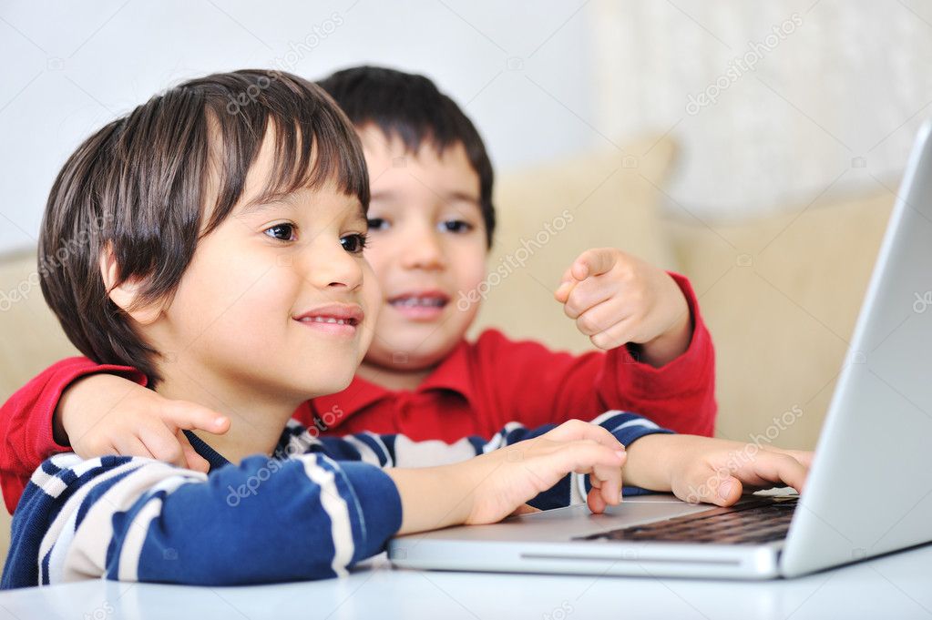 Kids using laptop