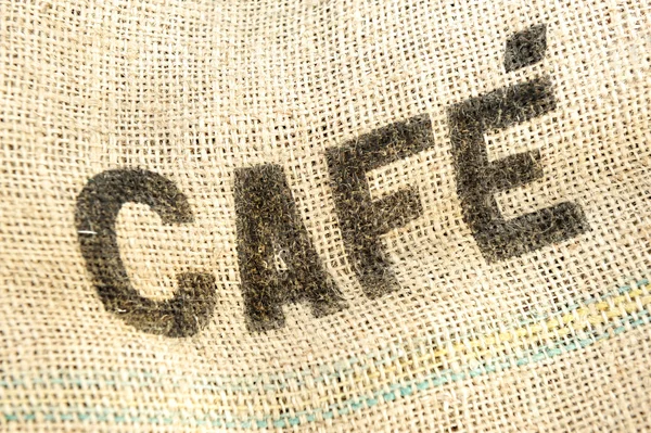 Caffee, saco de café, fundo grunge tecido — Fotografia de Stock