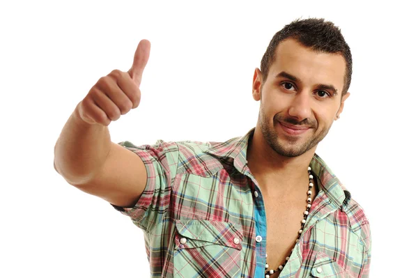 Glücklich lässiger junger Mann zeigt Daumen nach oben und lächelt isoliert auf weißem Rücken — Stockfoto