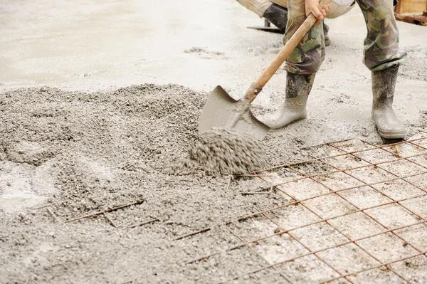Construction working assemble iron grids into the frame ready for concrete — Stock Photo, Image