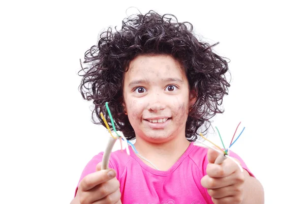 Cute girl is taking electrical wire — Stock Photo, Image