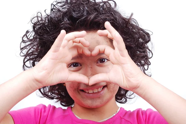 Flicka med hjärtformade händer — Stockfoto