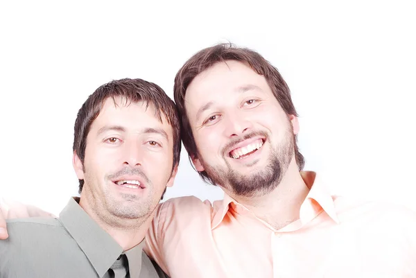 Двое улыбающихся мужчин — стоковое фото