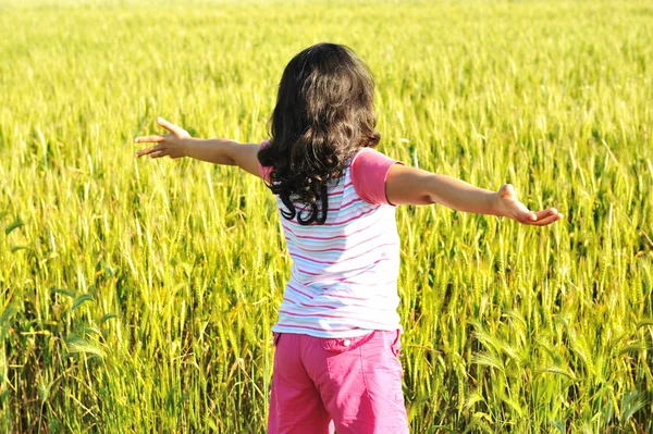 Freedom, girl in nature with opened arms — Stock Photo, Image