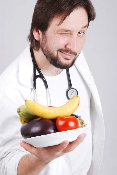 Doctor with healthy food — Stock Photo, Image