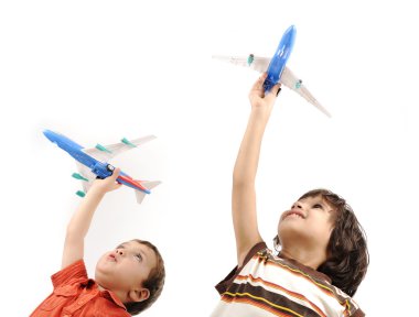 Two boys with airplains in hands clipart