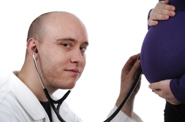 Doctor concentrating on pregnancy examination with stethoscope clipart