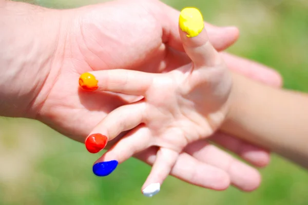 Color on hands. kid and father — Stock Photo, Image
