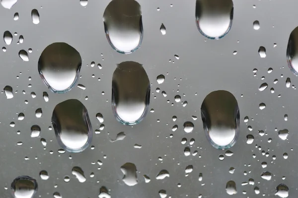 Natural big water drops on window glass — Stock Photo, Image