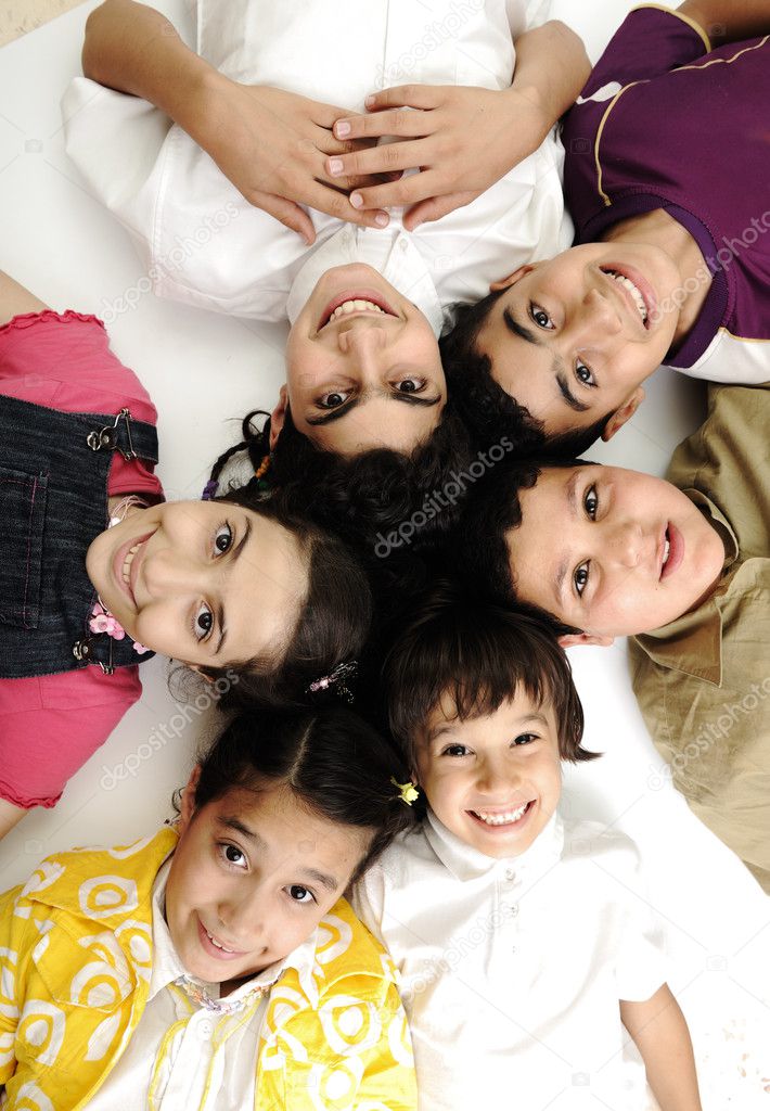 Vertical photo of children group, friends smiling isolated on white, boys