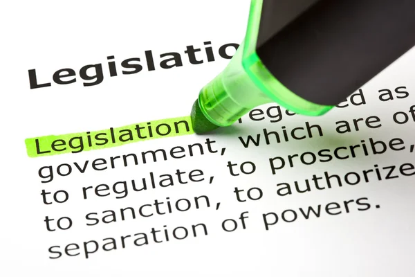 Ordet lagstiftning som lyfts fram i grönt — Stockfoto