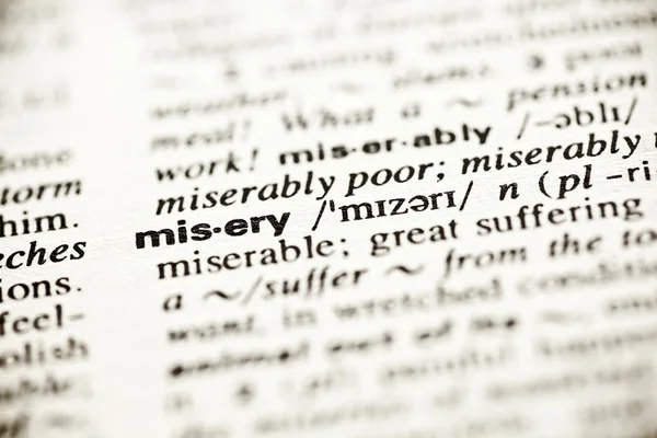 'Misery' - словарное определение виньетки — стоковое фото