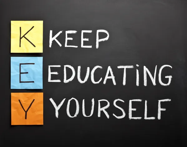Keep-educating-yourself-acronym — Stockfoto