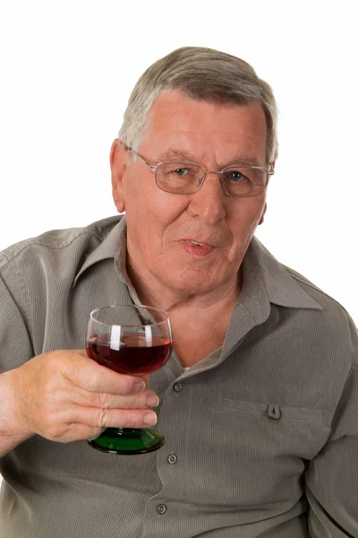 Kırmızı şarap ile yaşlı adam — Stok fotoğraf