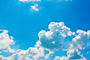 Blue sky with cumulus clouds clipart