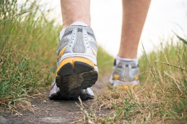 Walking man on trail clipart