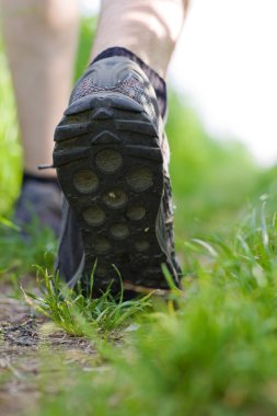 Mna walking in forest, exercise outdoors clipart