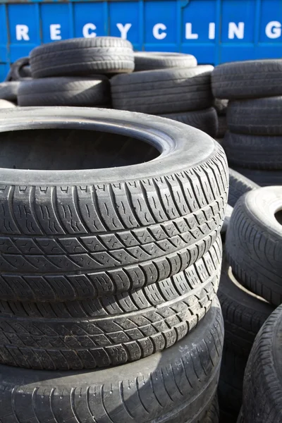 Recycling container and tires — Stock Photo, Image