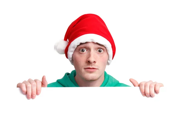 Chlap s santa hat a znamení — Stock fotografie