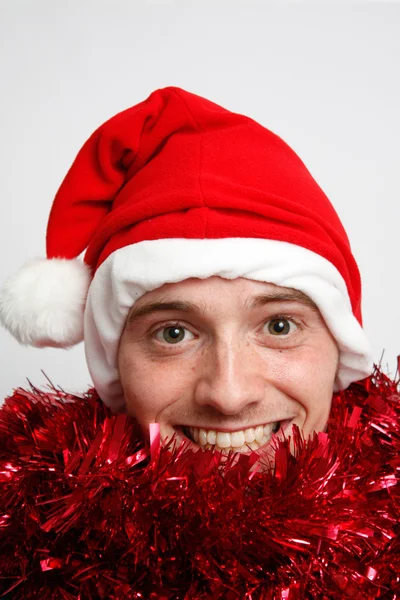 Man met kerst hoed — Stockfoto