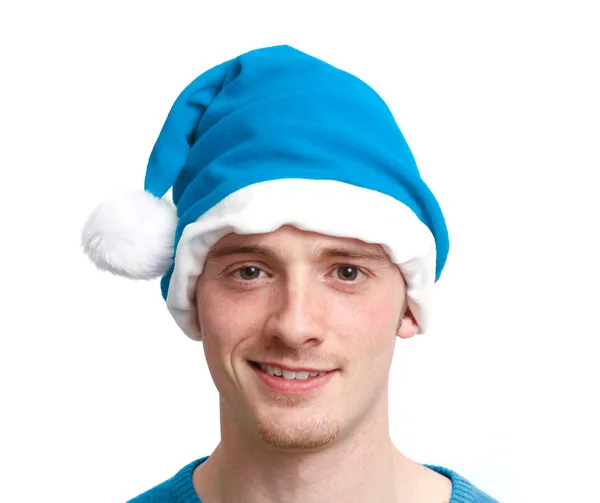 Хлопець з блакитним різдвяним капелюхом — стокове фото