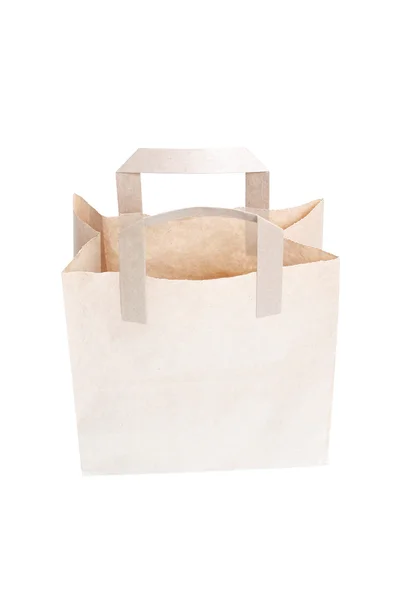 Um saco marrom isolado em branco — Fotografia de Stock