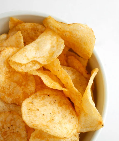 Potato chips in plate — Stock Photo, Image