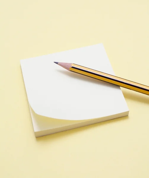 Pencil and note pad — Stock Photo, Image