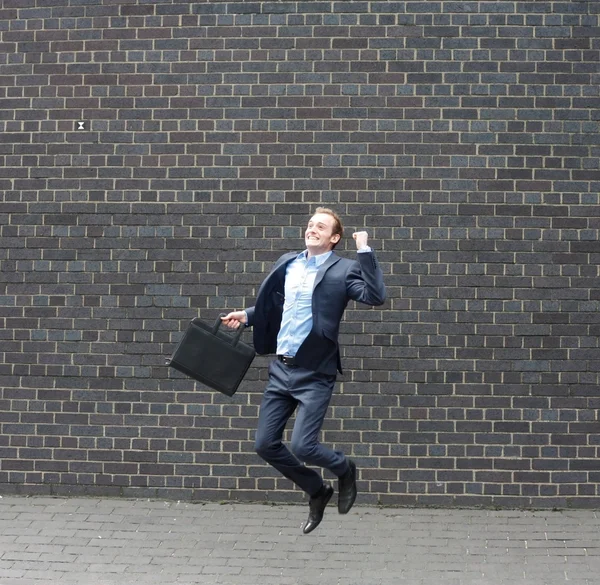 Geschäftsmann springt — Stockfoto