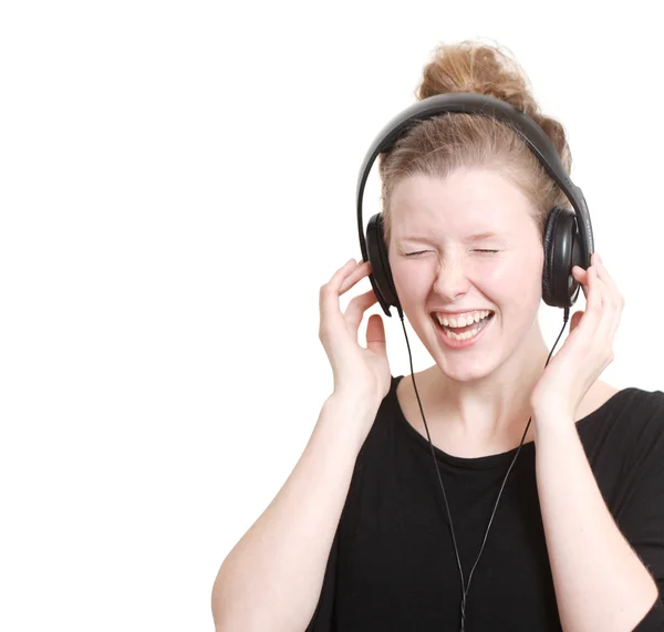 Woman listening to music — Stock Photo, Image