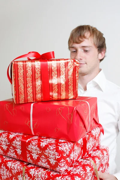 Presenting alot of gifts Royalty Free Stock Images