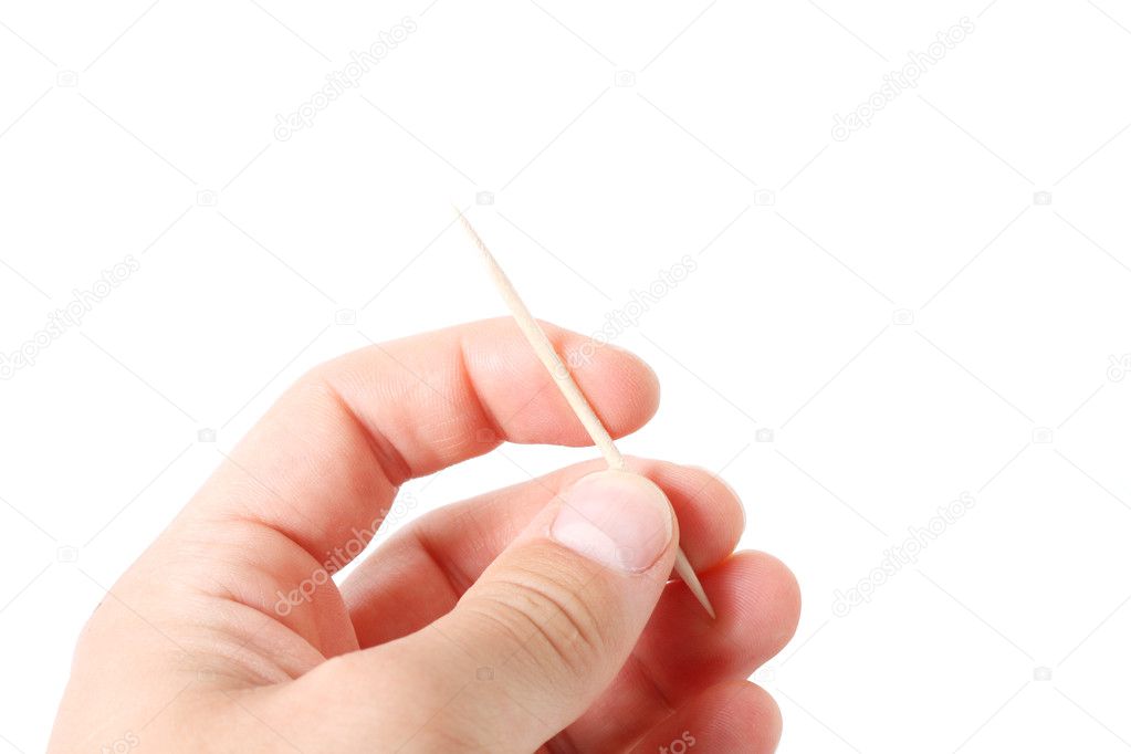 Hand holding toothpicks