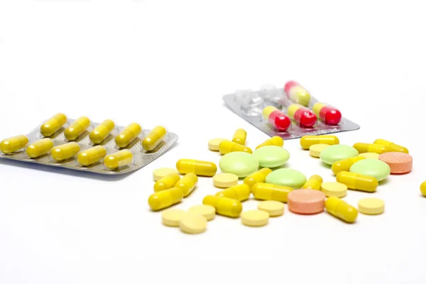 Pills on a white — Stok fotoğraf