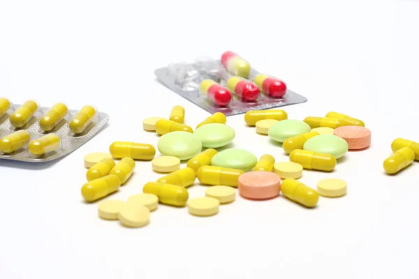 Pills on a white — Stok fotoğraf