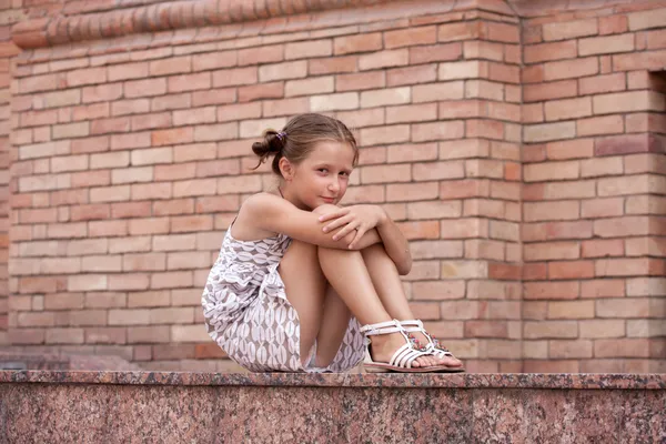 Girl lying on a stairs — Stock Photo, Image