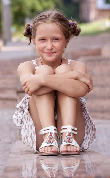 Girl lying on a stairs — Stock Photo, Image
