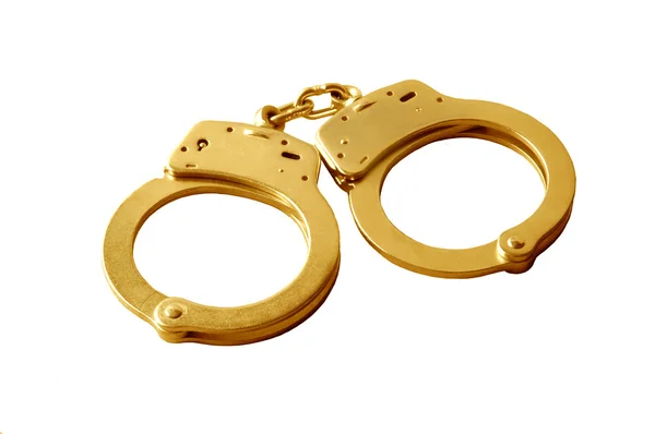 Golden handcuffs — Stock Photo, Image