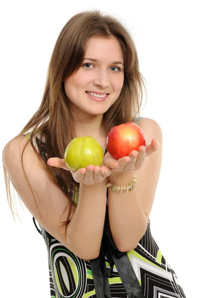Женщина держит два яблока — стоковое фото