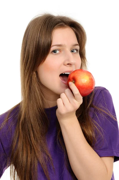 Young woman holding a red apple — Stock Photo, Image