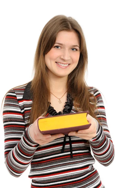 Молодая девушка представляет книгу — стоковое фото