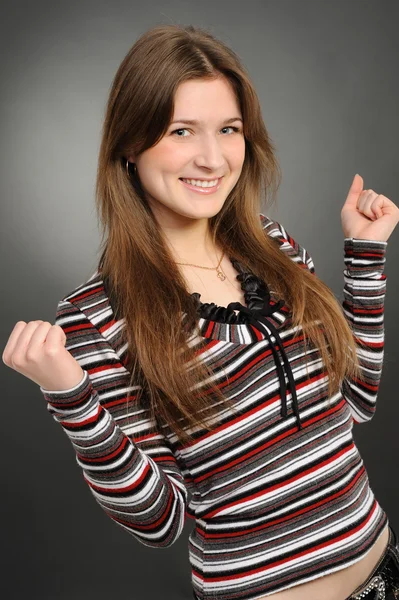 Excited youngwoman enjoying success — Stock Photo, Image