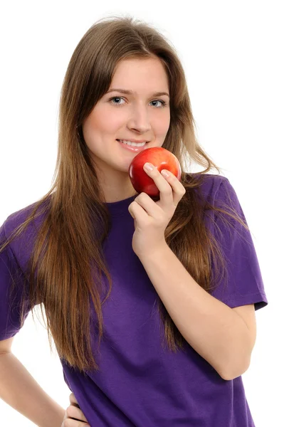 Young woman holding a red apple — Stock Photo, Image