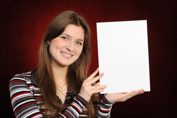 Young woman holding empty white board — Stock Photo, Image