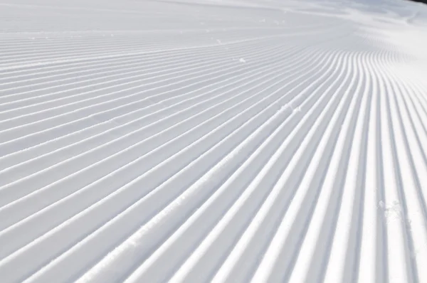 stock image Tracks on ski slopes at beautiful sunny winter day