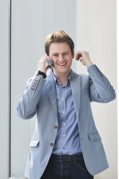 Young business man talk by cellphone — Stock Photo, Image