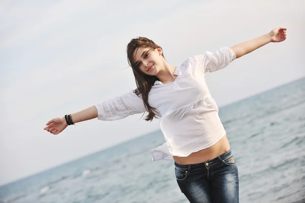 Young woman enjoy on beach Stock Picture