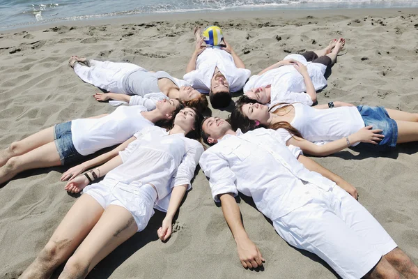 Group of happy young in have fun at beach — Stock Photo, Image