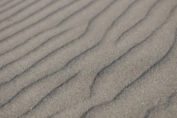 Areia no fundo da praia — Fotografia de Stock Grátis