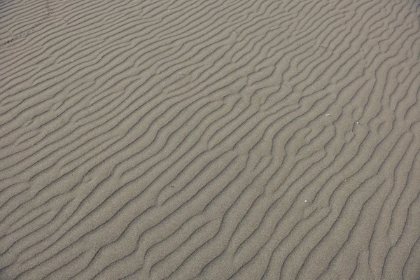 Areia no fundo da praia — Fotografia de Stock