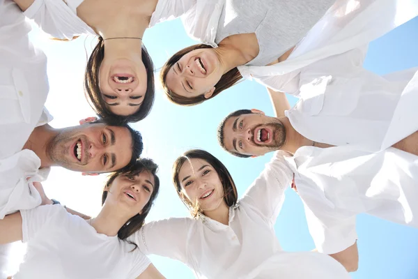 Group of happy young in have fun at beach — Stock Photo, Image